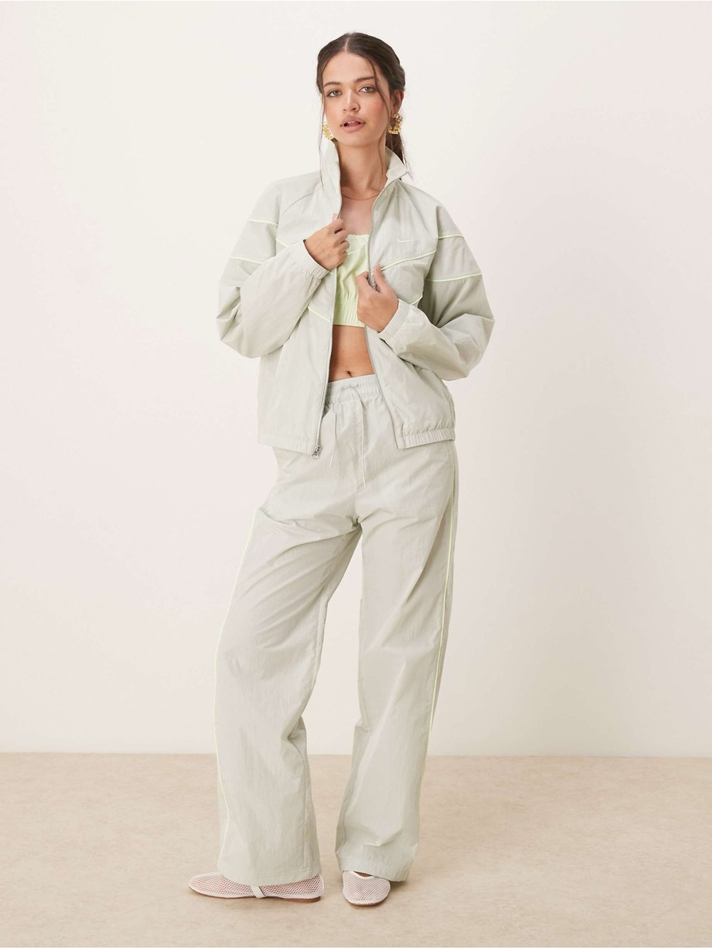 Nike Women's Wide-Leg Track Set in beige
